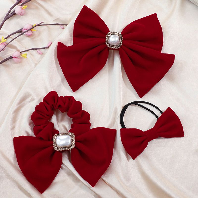The new red large bow headwear for brides in 2025, the wedding hair tie, the popular hairpin, the back of the head clip, summer detail image 5