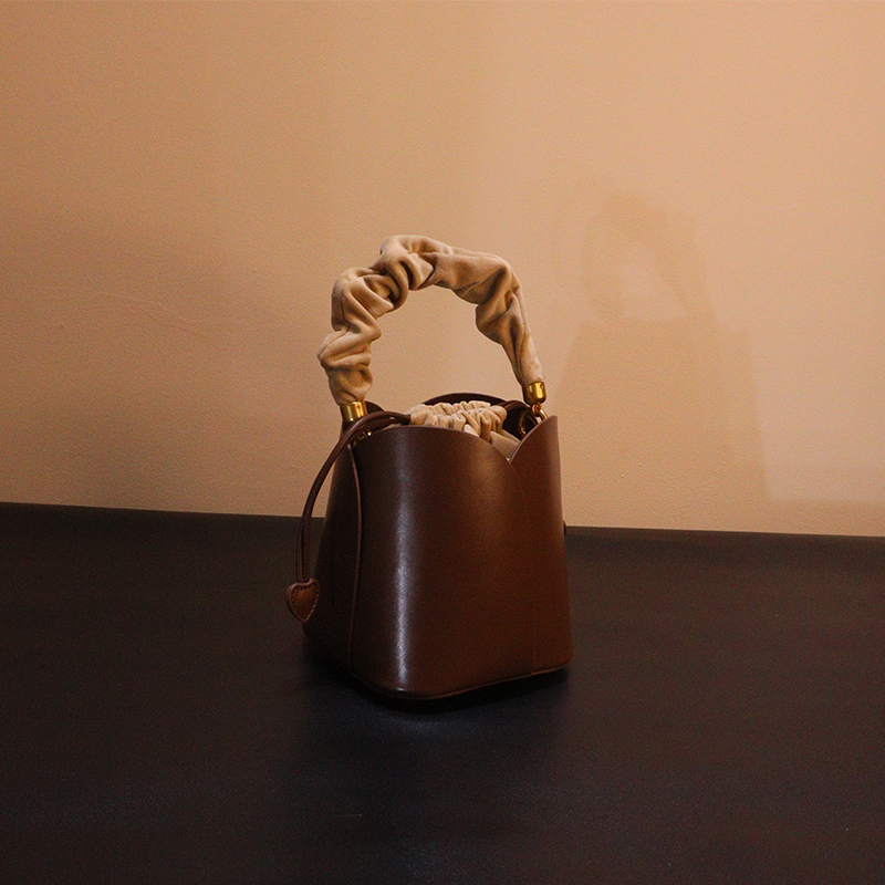 women's bag 2025 new bucket bag special-interest design vegetable basket bag high-grade petal flower portable messenger bag full figure