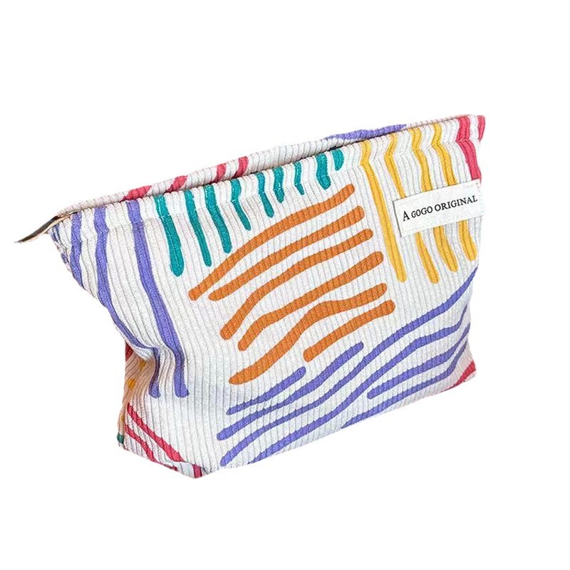 ins niche corduroy contrast color striped make-up bag portable travel travel skin care products buggy bag wash bag Item Picture