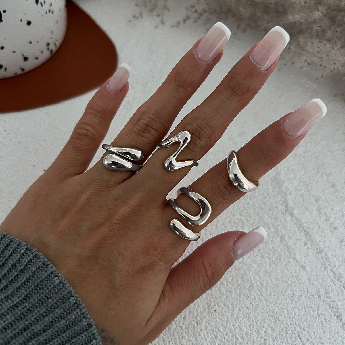 europe and america cross border hot selling bracelet personalized glossy irregular geometric knuckle ring hip hop style women's ring set Item Picture