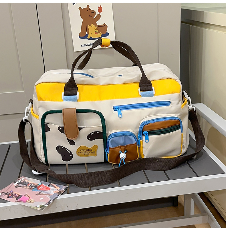 new high-grade niche short-distance travel bag women's large capacity luggage bag handbag maternity package contrast color gym bag full figure