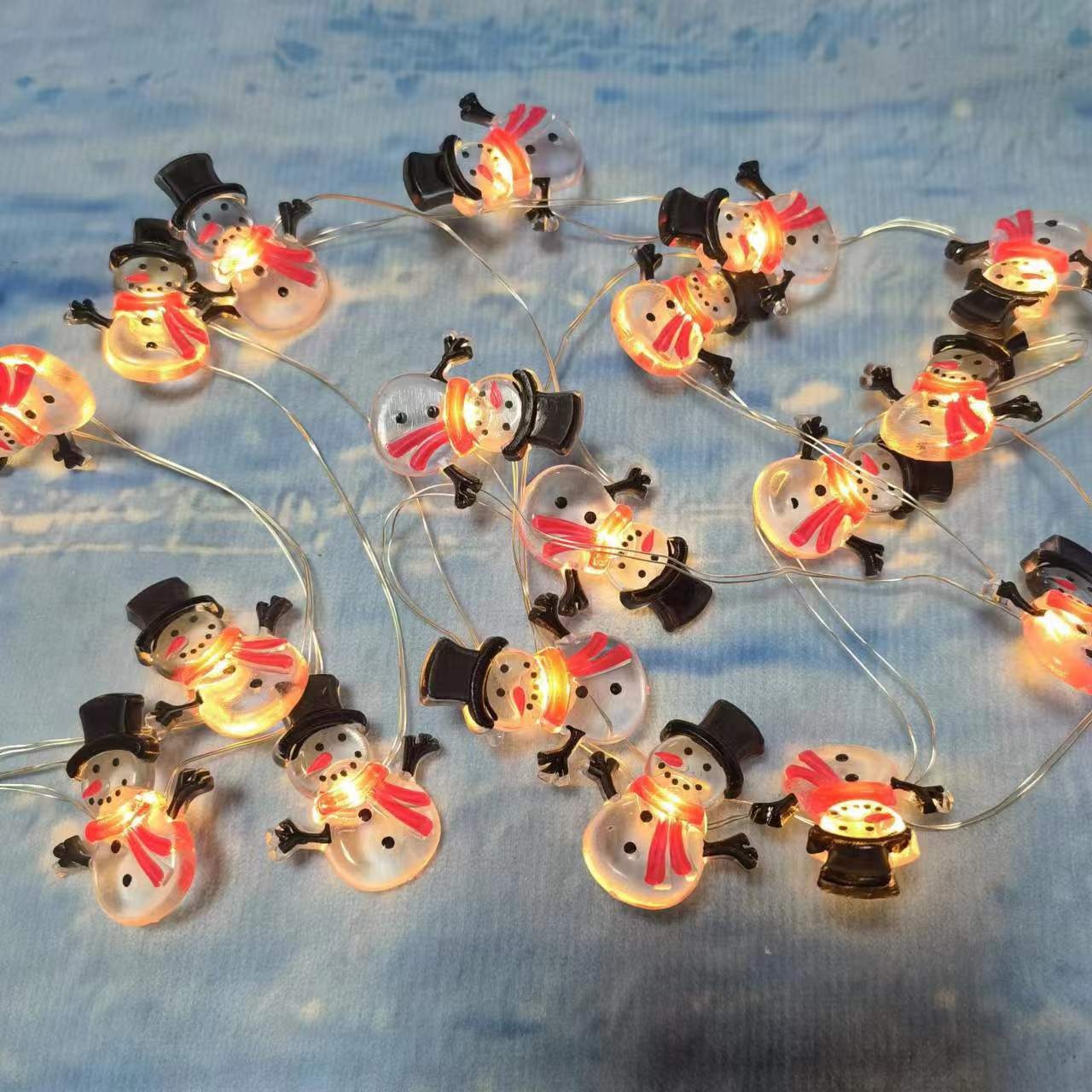 cross-border cute mini snowman christmas shape lighting chain led shape copper wire lamp holiday decoration atmosphere colored light string Application Scenario