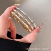 white shell bamboo bracelet female titanium steel bracelet high sense simple bracelet bracelet imitation shell bracelet bracelet hand jewelry Application Scenario