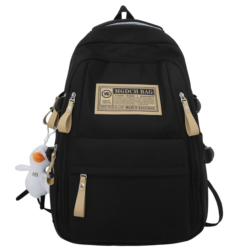 spring and summer simplicity travel primary school student backpack computer casual solid color ultralight junior and middle school students large capacity schoolbag full figure