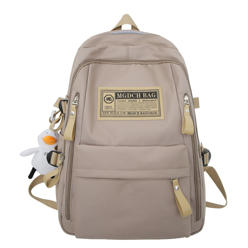 spring and summer simplicity travel primary school student backpack computer casual solid color ultralight junior and middle school students large capacity schoolbag Application Scenario