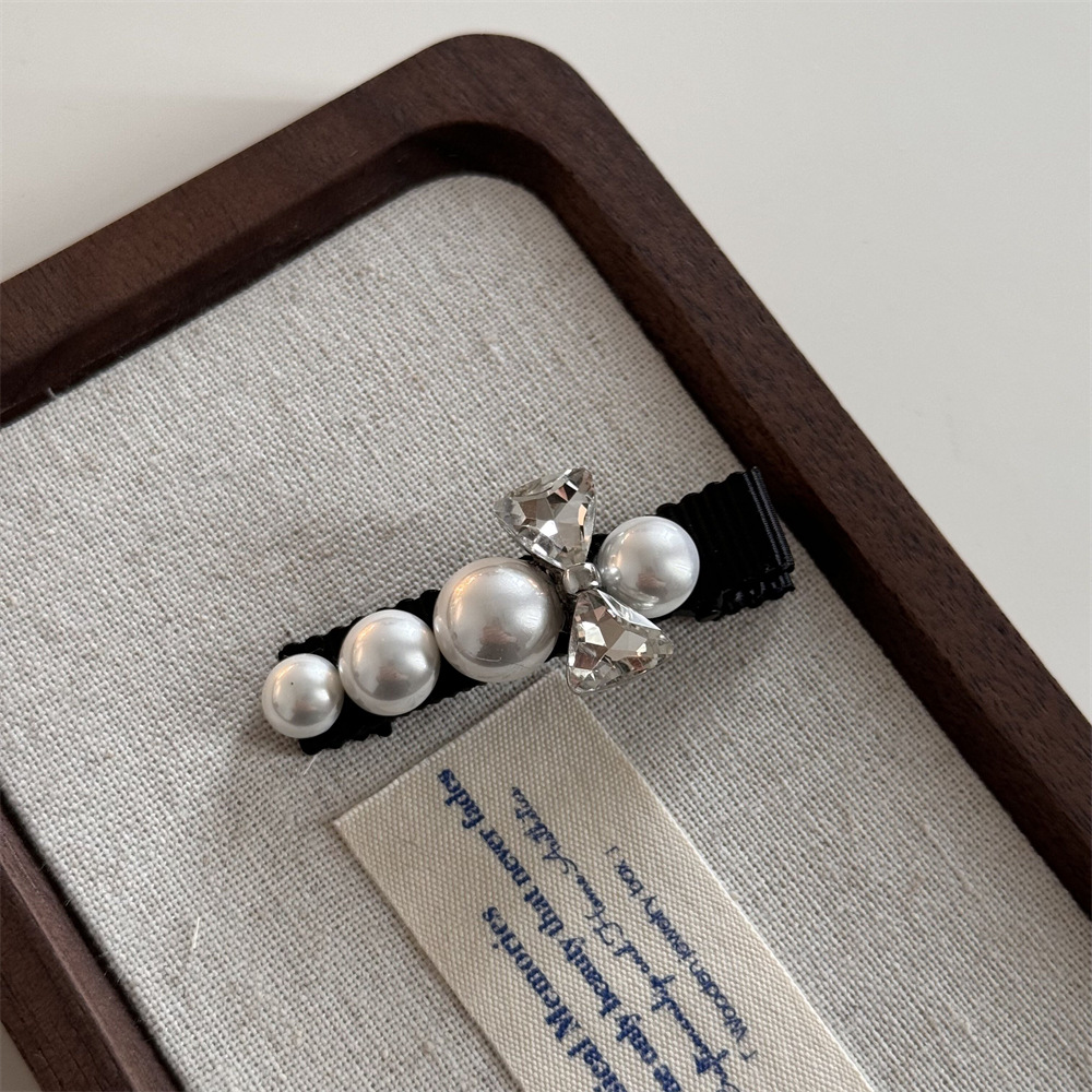 exquisite forehead high-grade rhinestone bow pearl edge clip side duckbill clip fringe hairpin headdress new details Picture