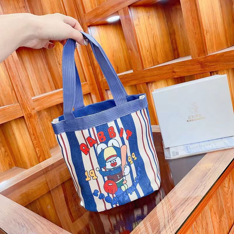 canvas bucket bag cute graffiti children's fun illustration portable round barrel mummy storage bag lunch box bag work small carrying bag Specification drawing