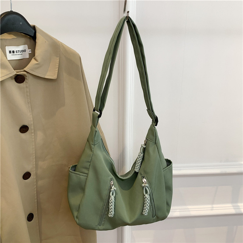 fashion large capacity versatile simple handbag travel bag student online red new wholesale women's shoulder messenger bag details Picture
