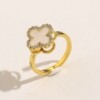 popular copper plating 18k ring rotating clover fritillary ring full diamond flowers openings adjustable index finger ring Application Scenario