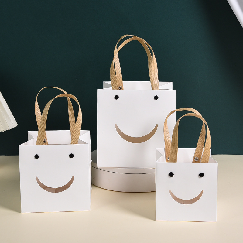 creative smiling face gift bag window rivet kraft paper portable paper bag cake flowers square bottom hand bag gift packaging full figure