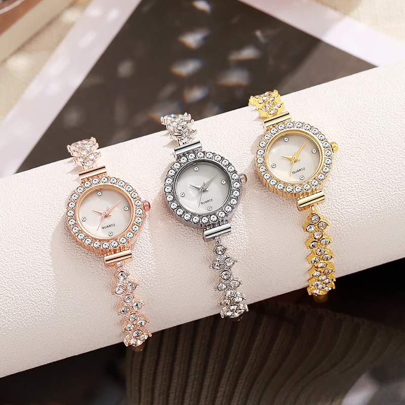 cross-border new arrival minority fashion diamond women's watch round full diamond women's student pull-out bracelet watch manufacturer full figure