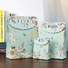 national trendy style vintage flower and bird gift bag gift packaging bag clothing handbag ornament paper bag high-end hand bag gift bag Application Scenario