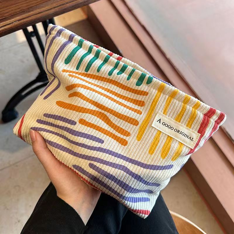 ins niche corduroy contrast color striped make-up bag portable travel travel skin care products buggy bag wash bag full figure