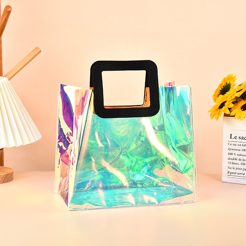 pvc laser handbag high-grade transparent colorful laser candy hand gift bag stall good-looking gift bag full figure