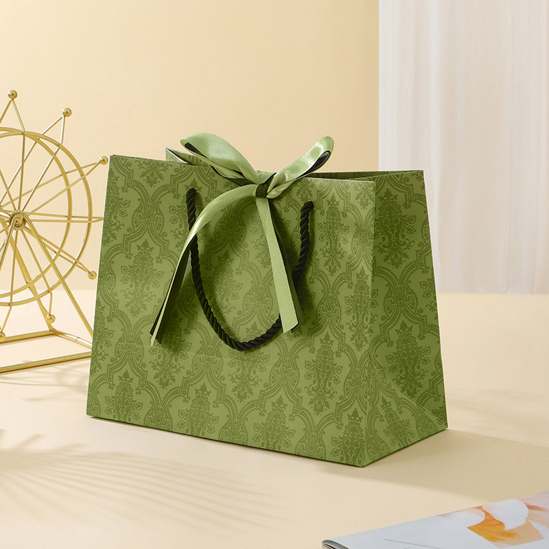 green gift bag green ribbon gift bag clothing handbag gift box with handbag gift packaging bag full figure
