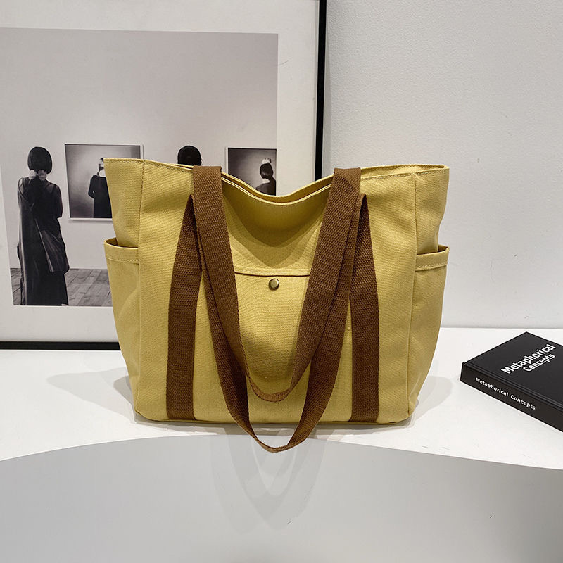 large capacity tote canvas bag for work and going out good-looking commuter's all-matching art student book one shoulder bag bag Application Scenario
