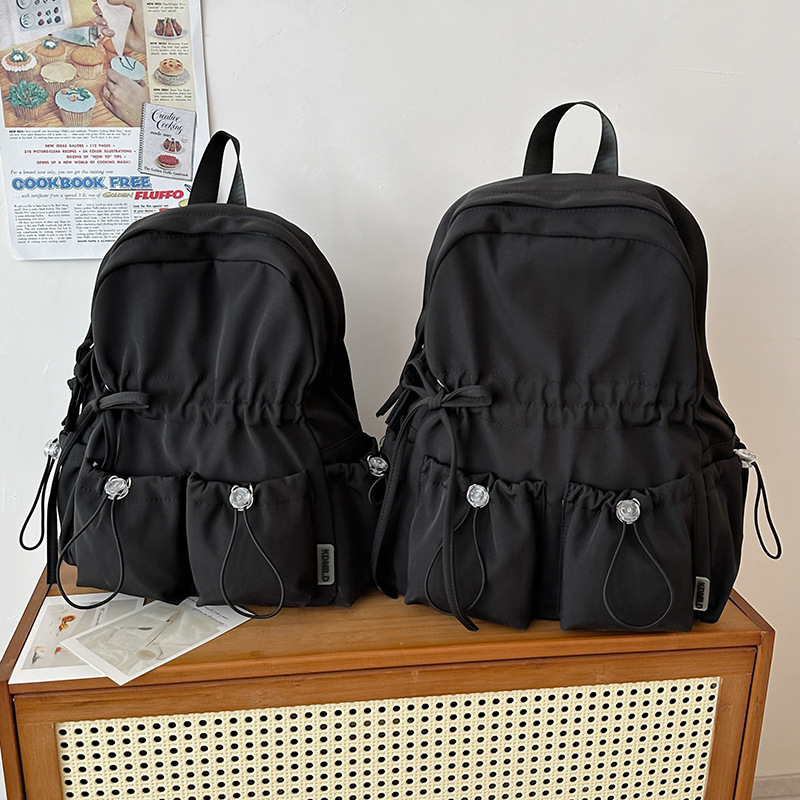 2026 cross-border macaron color backpack large capacity schoolbag female junior high school student cute bow high school student backpack female full figure