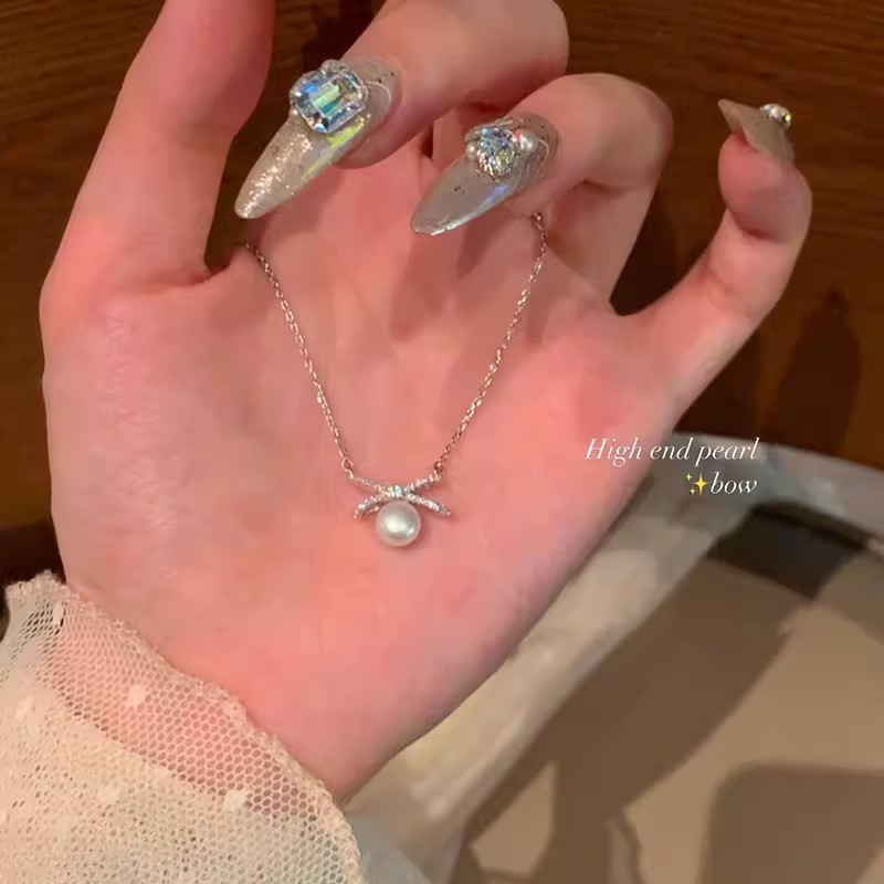 ins style pearl bow necklace for women light luxury minority high-grade clavicle chain summer super fairy new ornament details Picture
