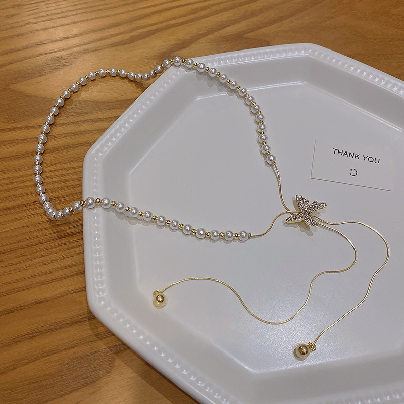 best-seller on douyin pull-out pearl necklace women's all-match niche design butterfly pendant clavicle chain accessories wholesale details Picture