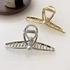 girl with pearl barrettes ~ graceful geometric simple grip hair accessories headdress korean pearl alloy hair claw Application Scenario