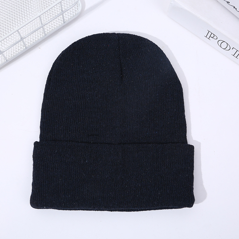 curling beanie hat embroidered logo solid color ski brimless pullover hat cold-proof knitted hat foreign trade woolen cap wholesale Item Picture