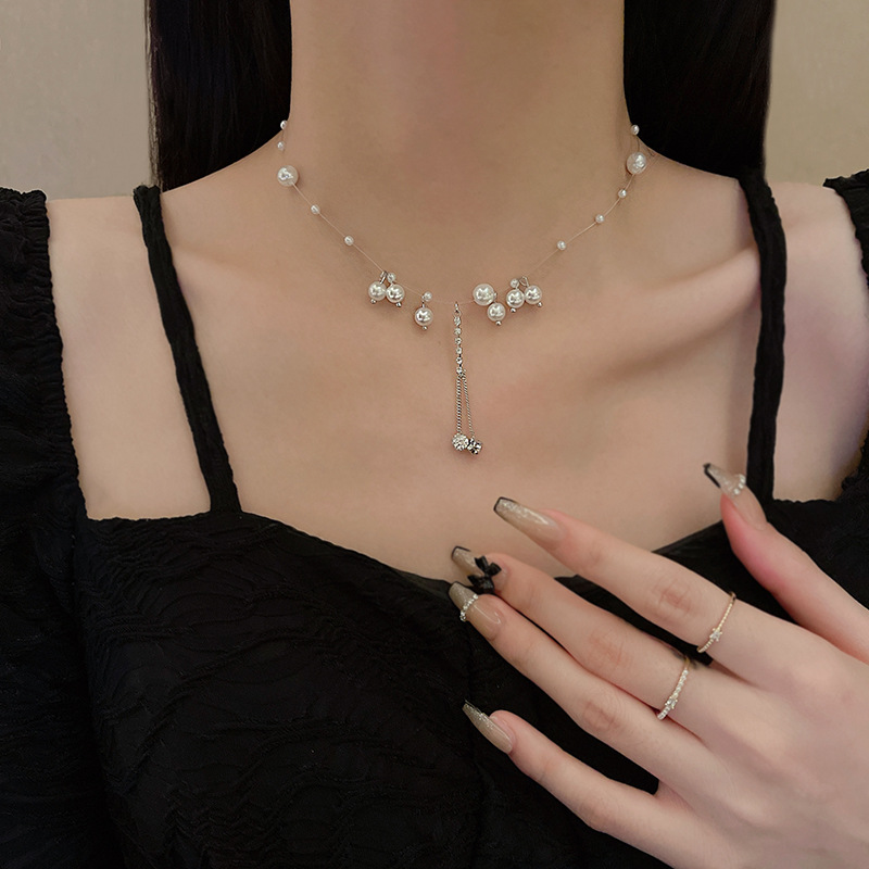 european and american super fairy zircon tassel necklace women's high sense vintage pearl fishing line clavicle chain all-match hot girl jewelry details Picture
