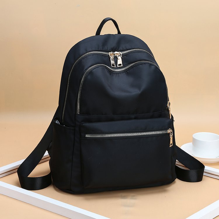 2025 new women's backpack casual backpack large capacity women's bag waterproof schoolbag portable all-matching niche bags women's full figure