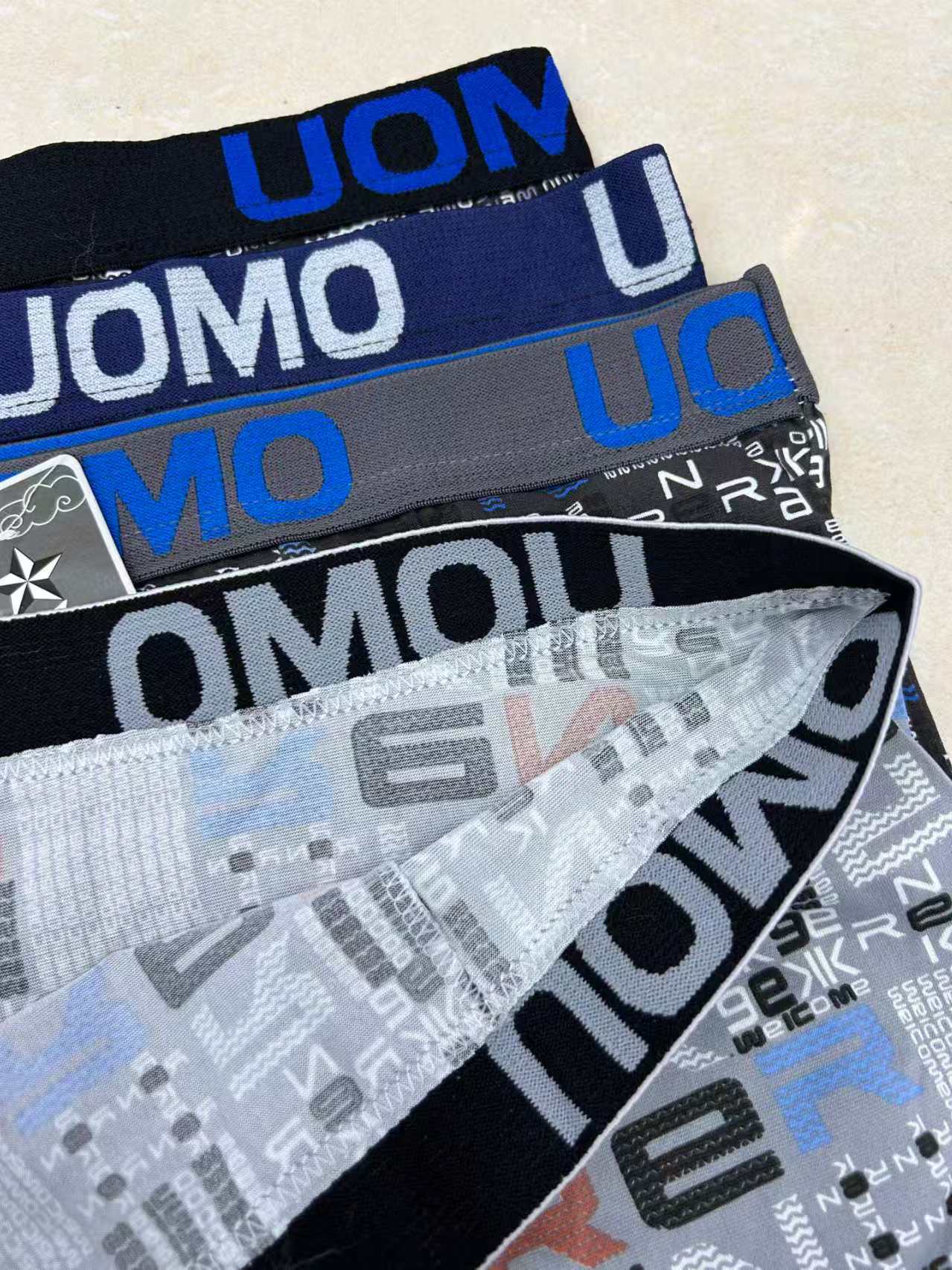 Ultra-low price letter waist patterned men's four-corner underwear, flat underwear, comfortable flat shorts for export to Europe, America and Africa. Men's underwear in stock details Picture