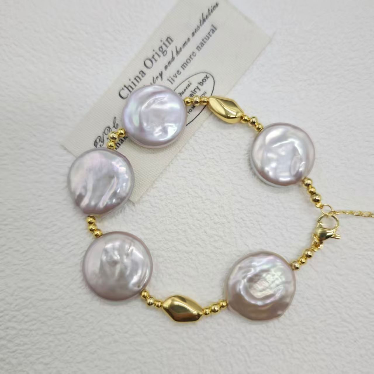 粉紫色圆片巴洛克珍珠饰品细节图