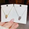 Copper-plated real gold pendant, fashionable and light luxury, full zirconium four-row double-ring necklace, niche, simple and high-end accessory, factory price Application Scenario