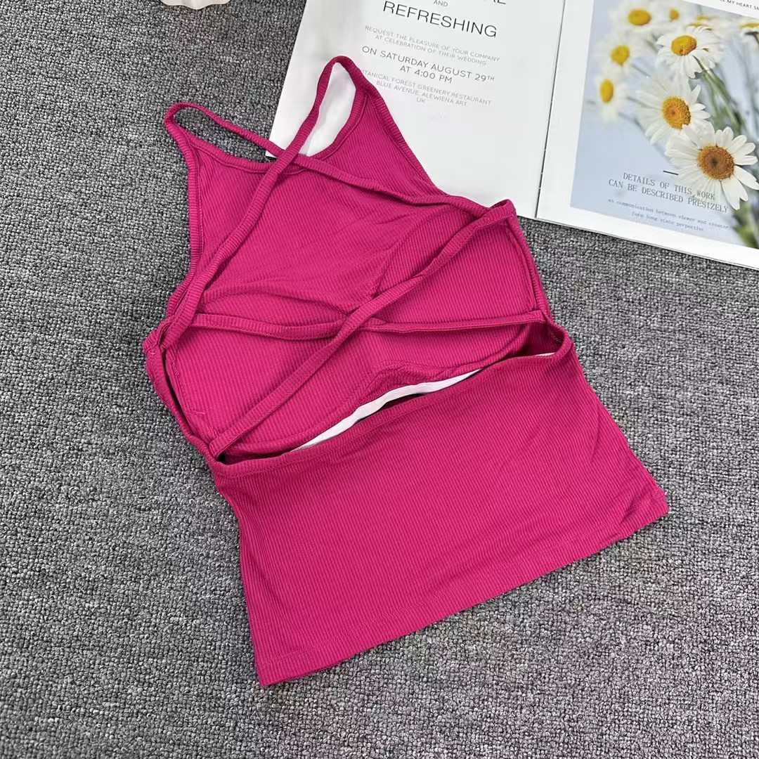 This is an export women's vest with a chest pad and an integrated beautiful back halter. It features a sexy and thoughtful backless design. The sexy small halter women's vest can be worn outside Application Scenario
