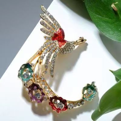 大气滴油点钻凤凰胸针