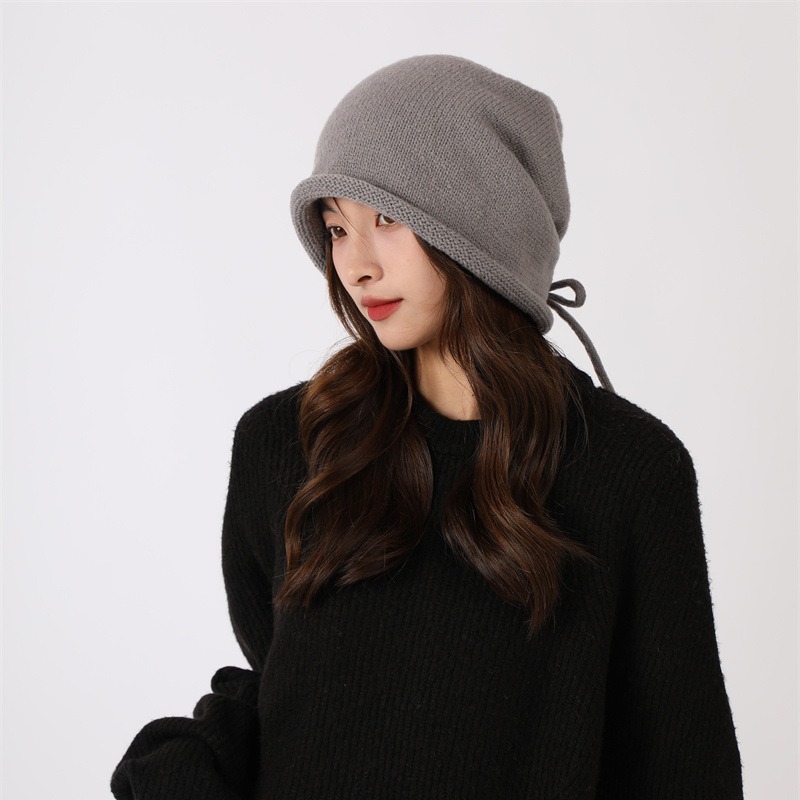 The popular "Dui Dui Hat" is a Japanese-style hat for autumn and winter that shows off one's face. It features a small bun, a cold hat with a big head and a drawstring, rolled-up edge knitted woolen hat Specification image