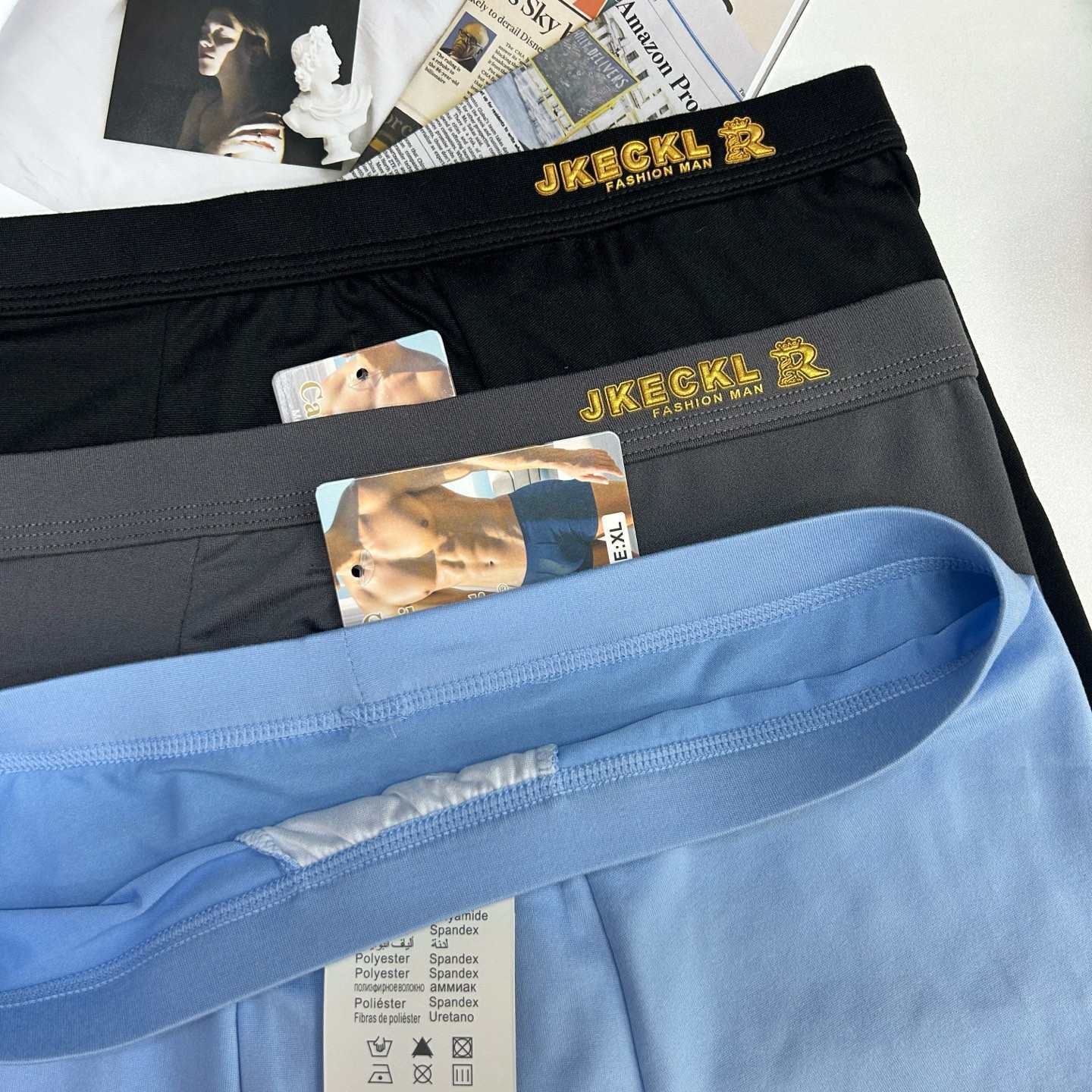Mid-waist men's underwear fabric, comfortable youth four-corner slit, flat-corner slit, export factory in stock, men's epoxy resin flat-corner pants, men's underwear Specification drawing