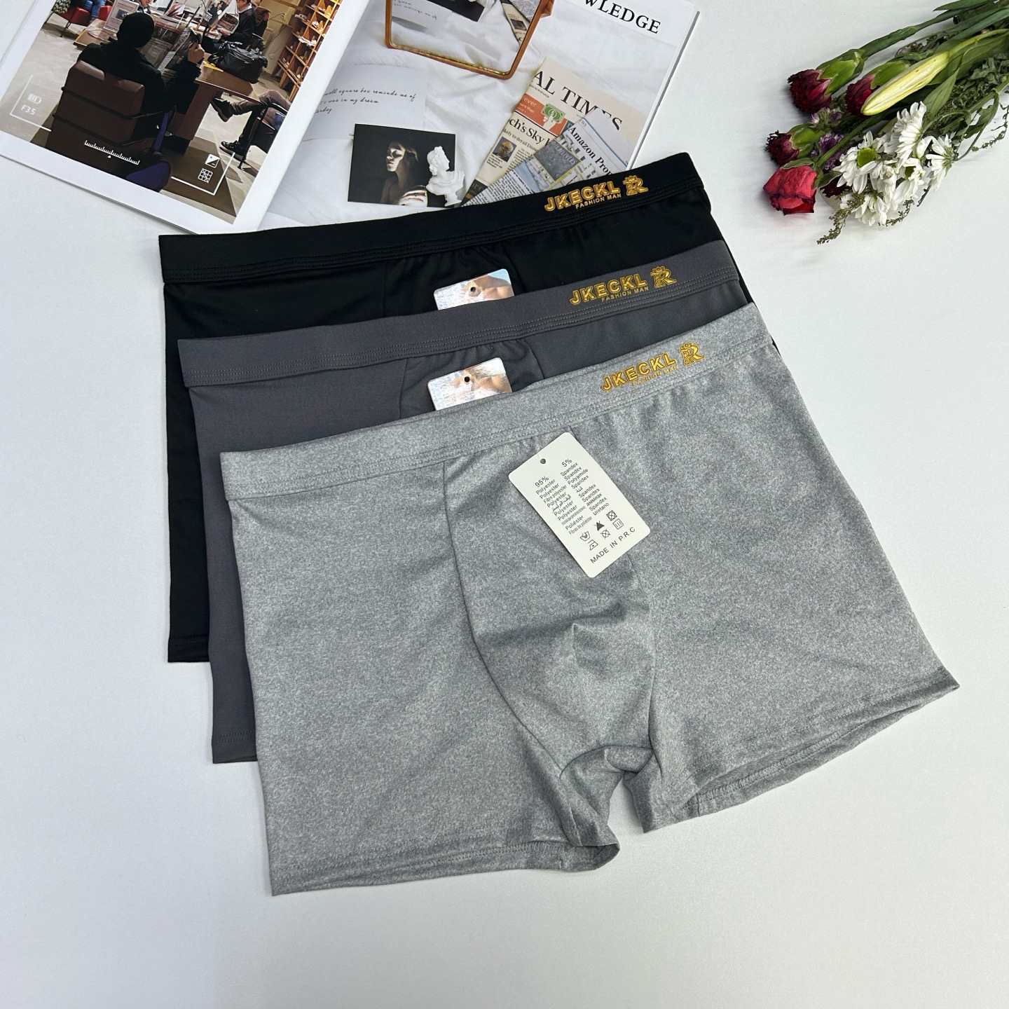 Mid-waist men's underwear fabric, comfortable youth four-corner slit, flat-corner slit, export factory in stock, men's epoxy resin flat-corner pants, men's underwear details Picture