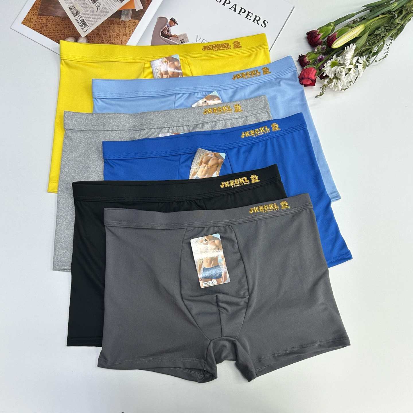 Mid-waist men's underwear fabric, comfortable youth four-corner slit, flat-corner slit, export factory in stock, men's epoxy resin flat-corner pants, men's underwear full figure
