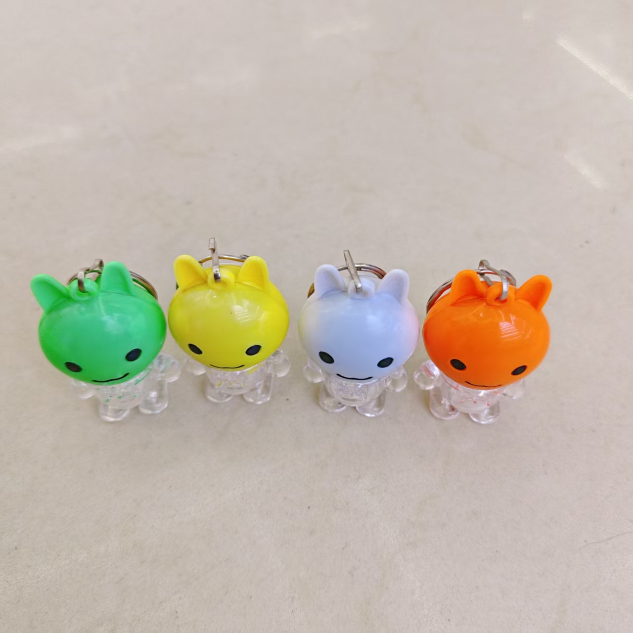 Cute rabbit-shaped keychain light, flashing toy night light, four-color adorable appearance, lighting up the little joys of daily life. Factory wholesale 201 Specification image