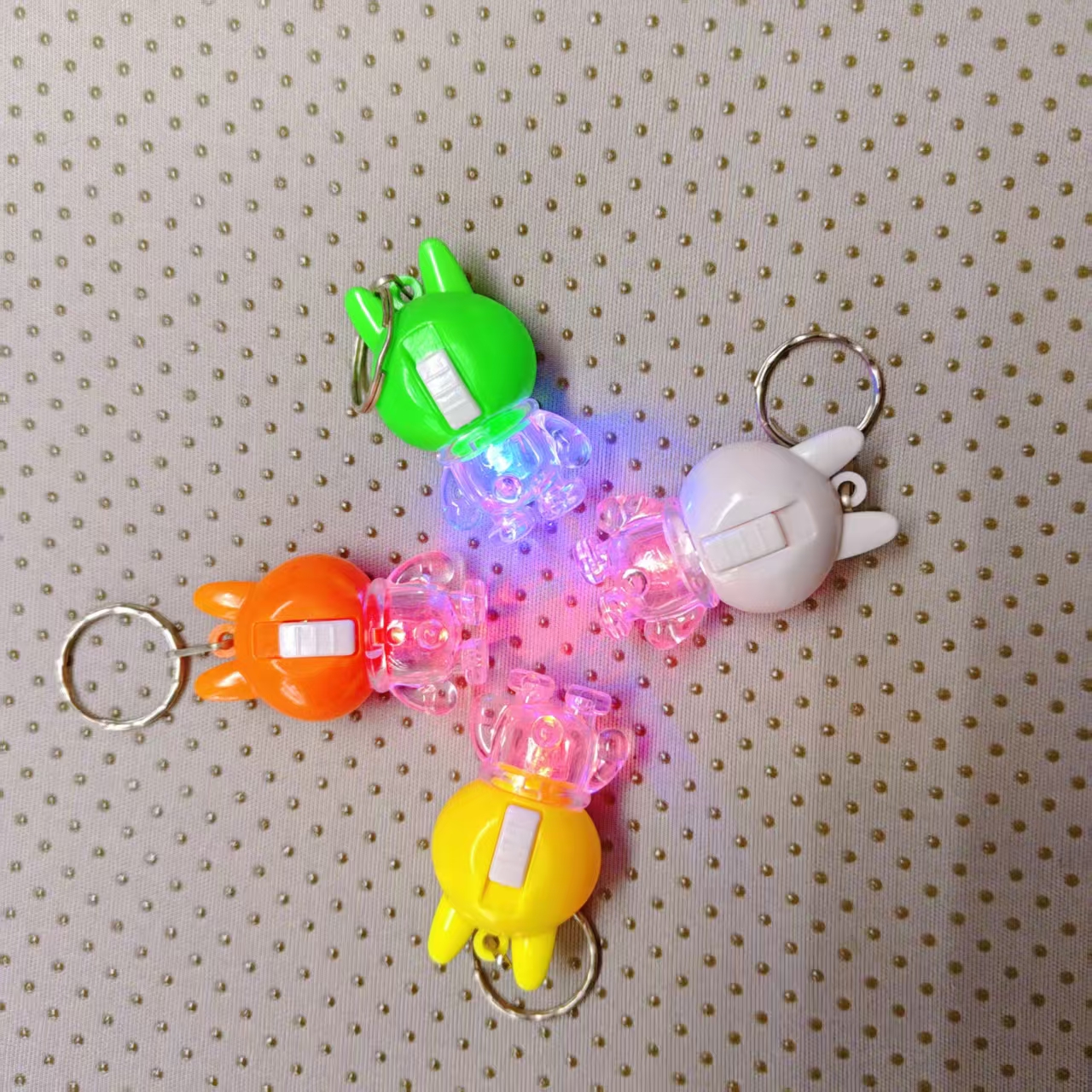 Cute rabbit-shaped keychain light, flashing toy night light, four-color adorable appearance, lighting up the little joys of daily life. Factory wholesale 201 details Picture