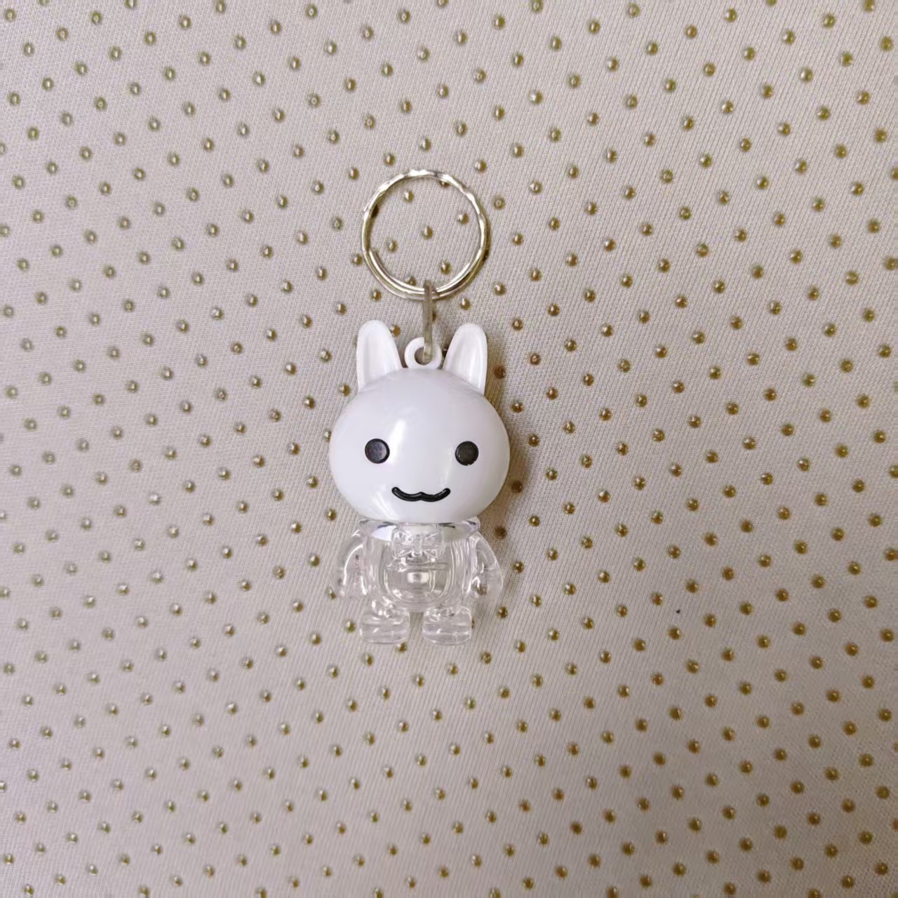 Cute rabbit-shaped keychain light, flashing toy night light, four-color adorable appearance, lighting up the little joys of daily life. Factory wholesale 201 Item Picture