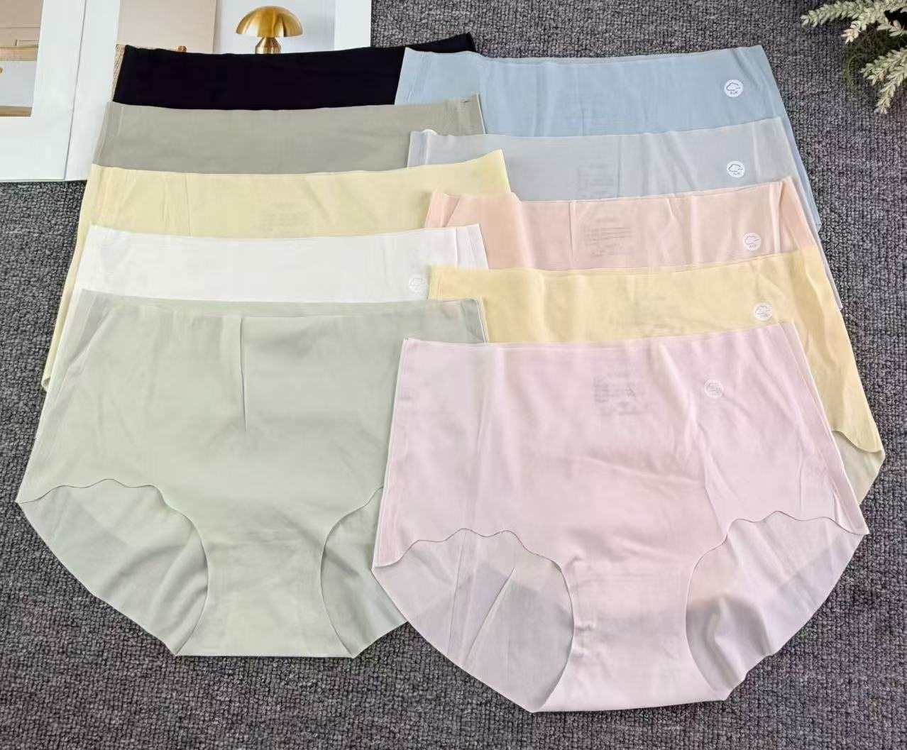 Stock surplus for export to Europe and America. Multi-color mid-waist wavy edge women's underwear. Simple solid color. One-cut brocade swimming fabric. Does not press on the skin. Cotton crotch is skin-friendly and non-irritating full figure
