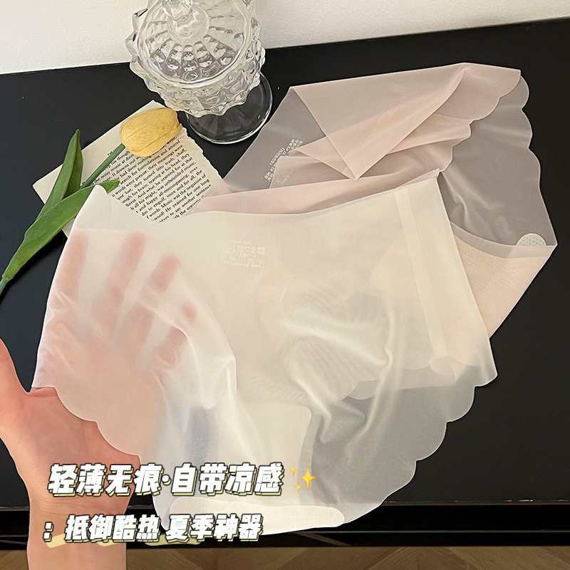 Stock surplus for export to Europe and America. Multi-color mid-waist wavy edge women's underwear. Simple solid color. One-cut brocade swimming fabric. Does not press on the skin. Cotton crotch is skin-friendly and non-irritating Item Picture