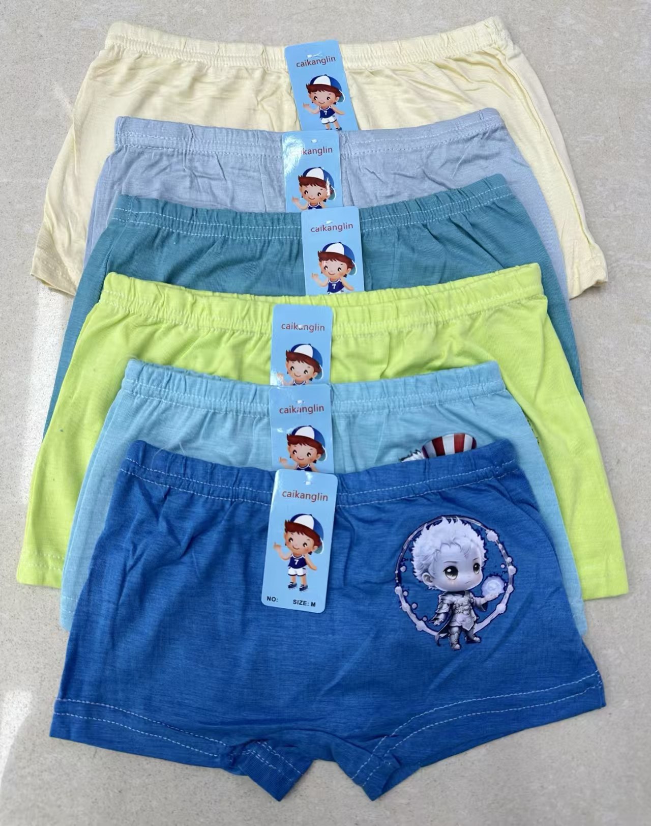 Solid color printed cartoon pattern boys' briefs in stock for export to Europe, America and Africa full figure