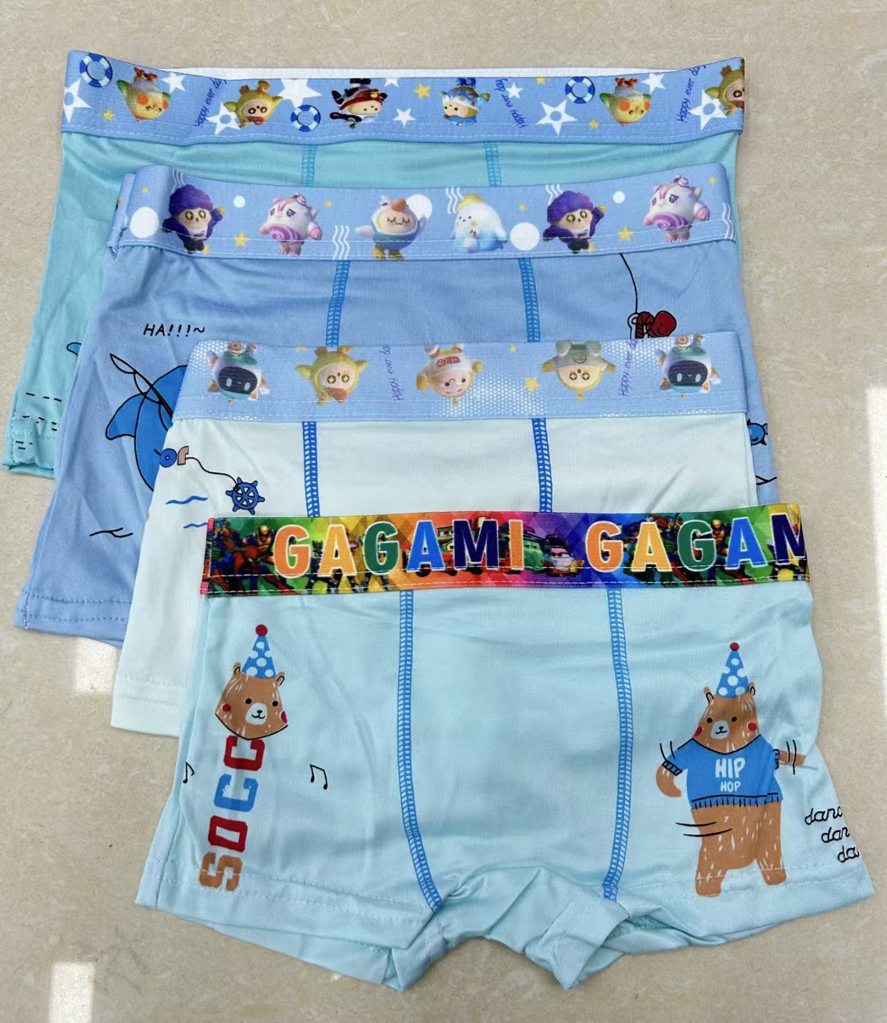 Mixed-color cartoon boys' briefs in stock for export to Europe, America and Africa full figure