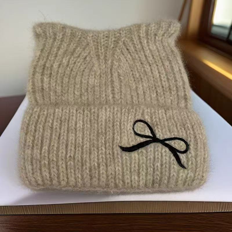 Women's cat ear autumn and winter new knitted hat, winter warmth, bow to show face, small cold hat, woolen hat Application Scenario