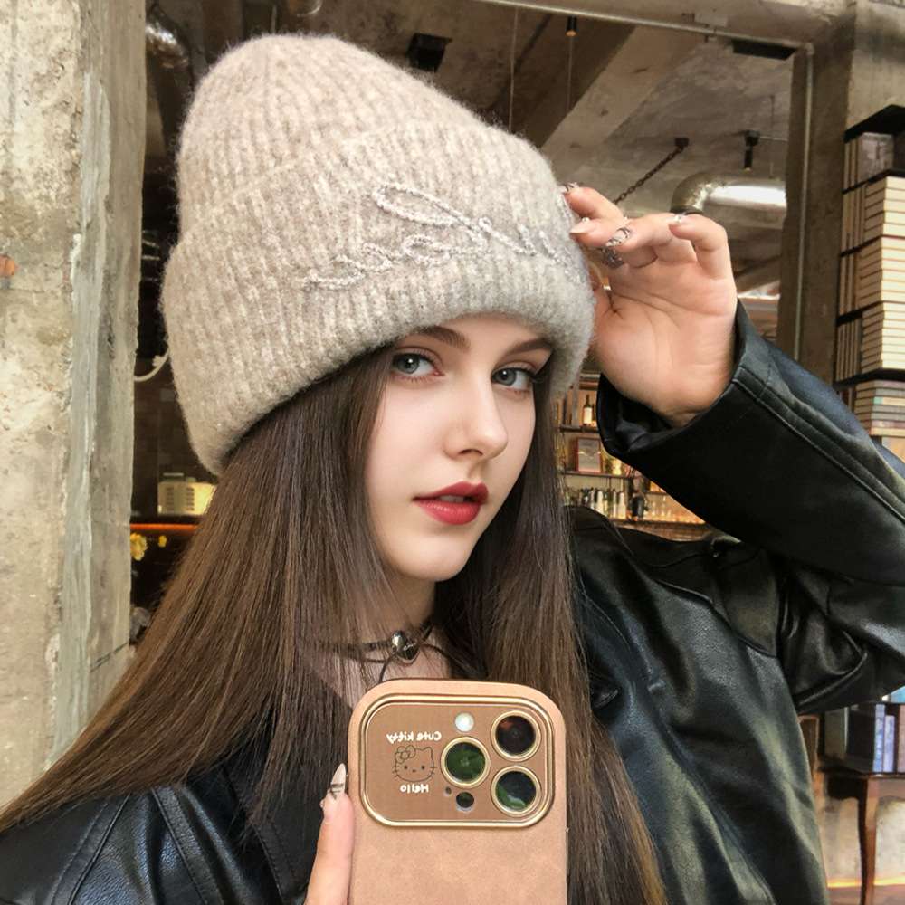 Korean autumn and winter new solid-color, versatile and trendy lettered ear-protecting woolen hat, large-sized face-enhancing small knitted hat Specification image