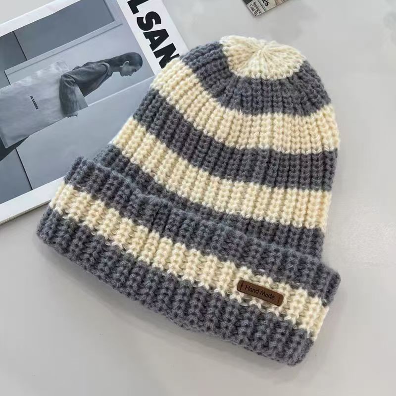 New autumn and winter versatile and fashionable large-head knitted cap, warm and ear-protecting trendy loose women's face-enhancing striped woolen cap Specification image