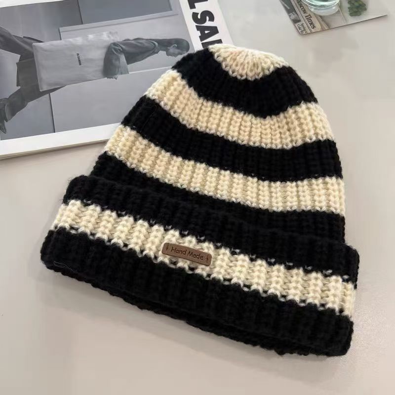 New autumn and winter versatile and fashionable large-head knitted cap, warm and ear-protecting trendy loose women's face-enhancing striped woolen cap Item Picture