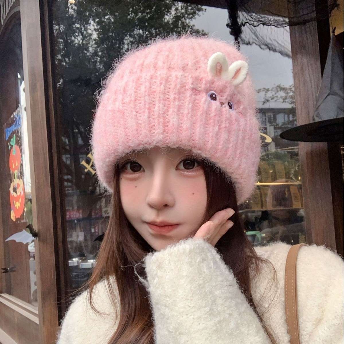 A new winter style of warm and cute rabbit knitted cap for women, casual and versatile, thickened warm ear-protecting simple woolen cap