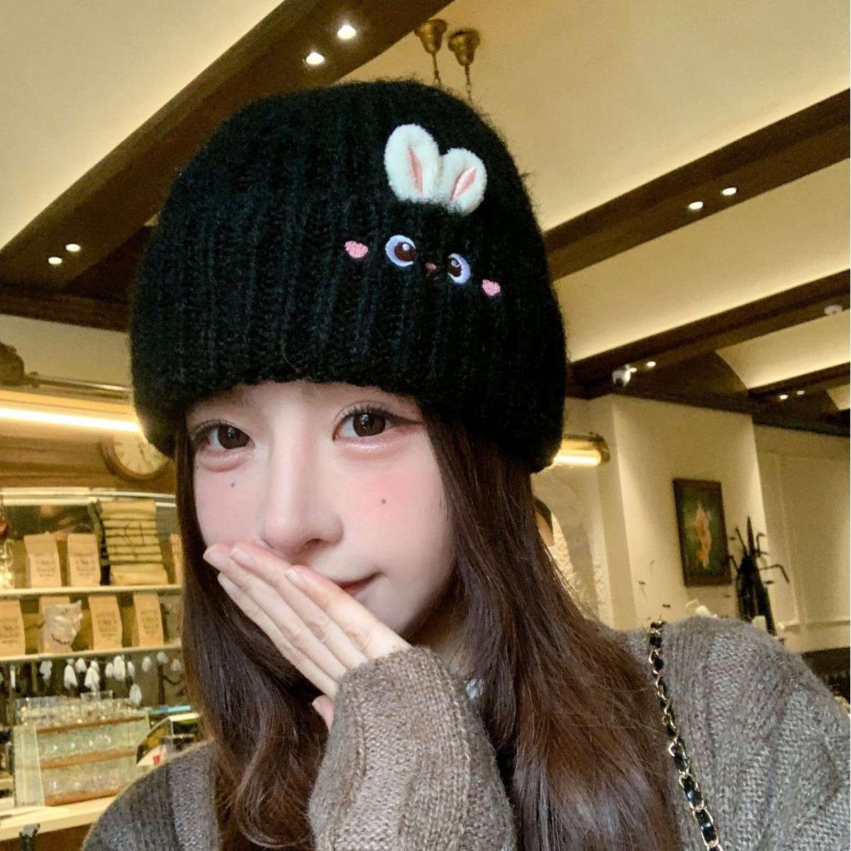 A new winter style of warm and cute rabbit knitted cap for women, casual and versatile, thickened warm ear-protecting simple woolen cap Specification image