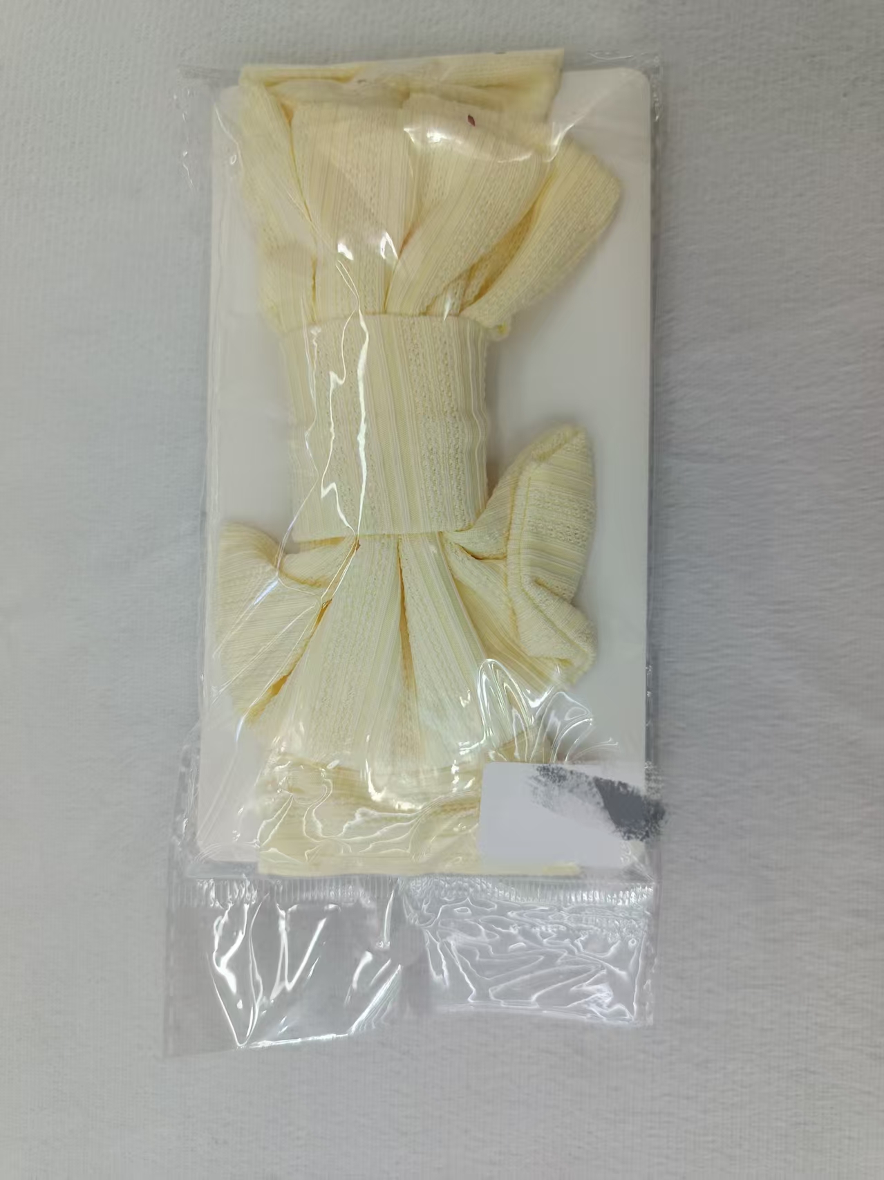 运动休闲浅黄色针织衣物摇粒绒空气层布料涤纶针织面料服装面料